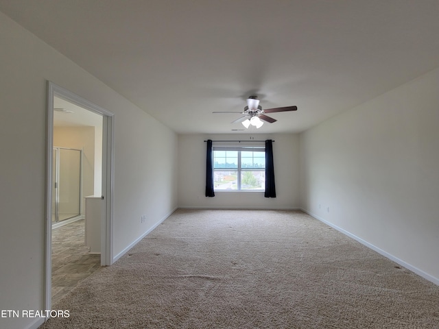 12043 Lillibridge Crossing Ln, Knoxville, TN 37932 - spare room featuring a ceiling fan, carpet floors, and baseboards