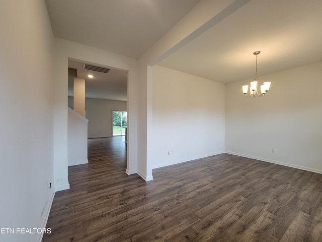 12043 Lillibridge Crossing Ln, Knoxville, TN 37932 - empty room with a chandelier, dark wood finished floors, and baseboards