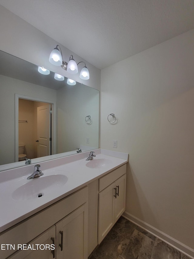 12043 Lillibridge Crossing Ln, Knoxville, TN 37932 - full bathroom with toilet, double vanity, and baseboards