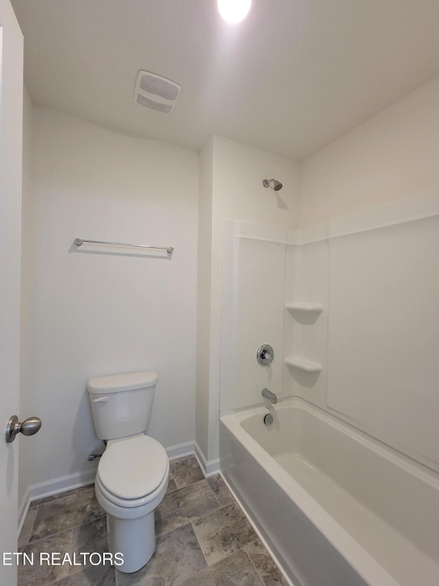 12043 Lillibridge Crossing Ln, Knoxville, TN 37932 - bathroom with toilet, baseboards, shower / tub combination, and stone finish flooring