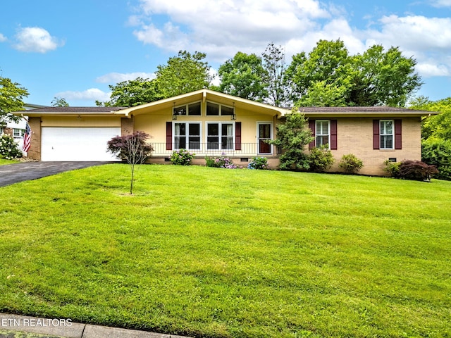120 Cooper Cir, Oak Ridge, TN 37830 - view of front of house featuring crawl space, asphalt driveway, a front yard, an attached garage, and brick siding