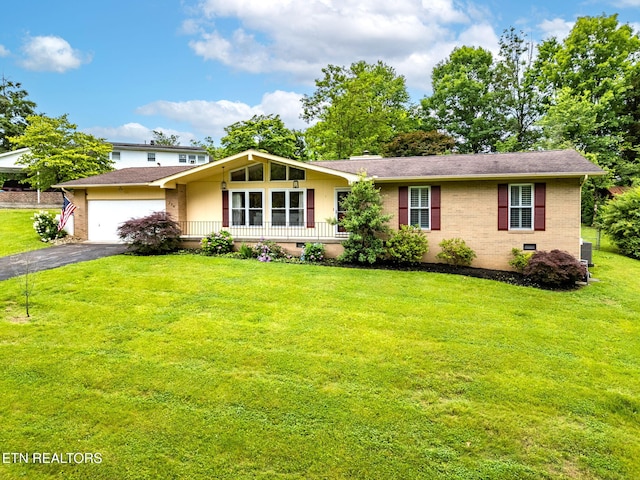 120 Cooper Cir, Oak Ridge, TN 37830 - view of front of house with brick siding, asphalt driveway, a front yard, crawl space, and a garage