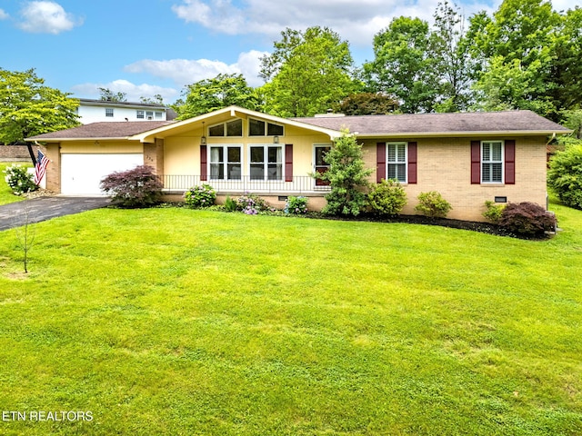 120 Cooper Cir, Oak Ridge, TN 37830 - view of front facade featuring crawl space, a front yard, driveway, and a garage