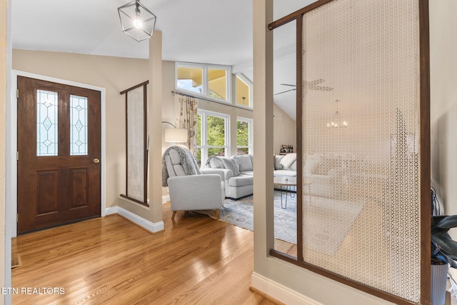 120 Cooper Cir, Oak Ridge, TN 37830 - entrance foyer with light wood-style flooring, baseboards, and lofted ceiling