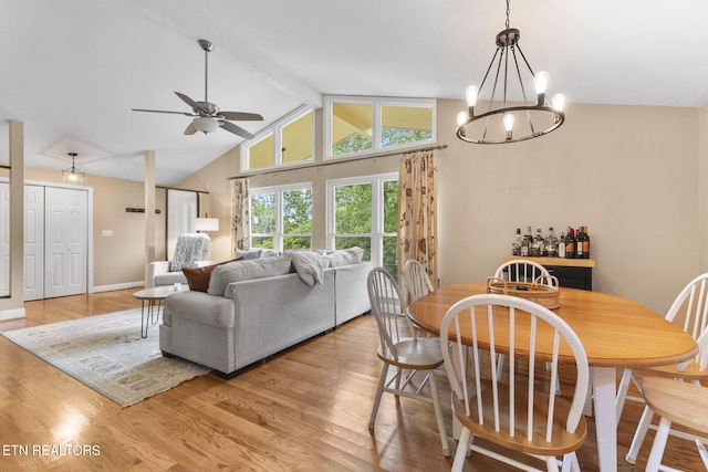120 Cooper Cir, Oak Ridge, TN 37830 - dining room featuring light wood-style floors, ceiling fan, a chandelier, and baseboards