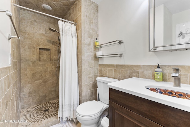 120 Cooper Cir, Oak Ridge, TN 37830 - bathroom with vanity, toilet, tiled shower, and tile walls