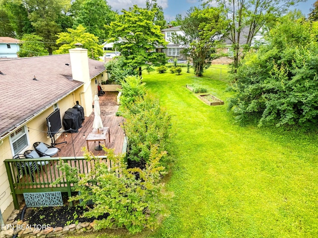 120 Cooper Cir, Oak Ridge, TN 37830 - view of green lawn with a wooden deck and a vegetable garden