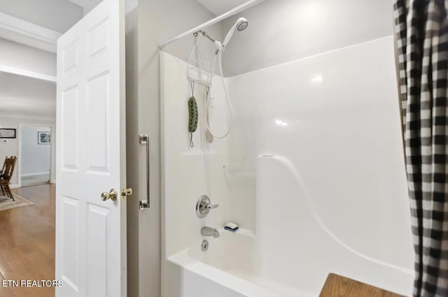 153 Creed Way, New Tazewell, TN 37825 - bathroom with shower / bathtub combination with curtain and wood finished floors