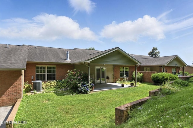 153 Creed Way, New Tazewell, TN 37825 - back of property featuring brick siding, a patio, a yard, and roof with shingles