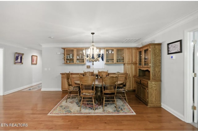153 Creed Way, New Tazewell, TN 37825 - dining room featuring a chandelier, crown molding, and wood finished floors