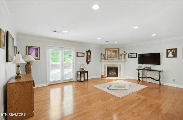 153 Creed Way, New Tazewell, TN 37825 - living area featuring a fireplace, wood finished floors, ornamental molding, and recessed lighting