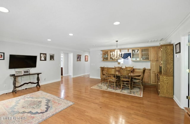 153 Creed Way, New Tazewell, TN 37825 - dining room featuring crown molding, a chandelier, light wood-style floors, and recessed lighting
