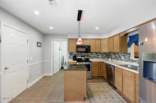 153 Creed Way, New Tazewell, TN 37825 - kitchen with appliances with stainless steel finishes, backsplash, a kitchen island, recessed lighting, and decorative light fixtures