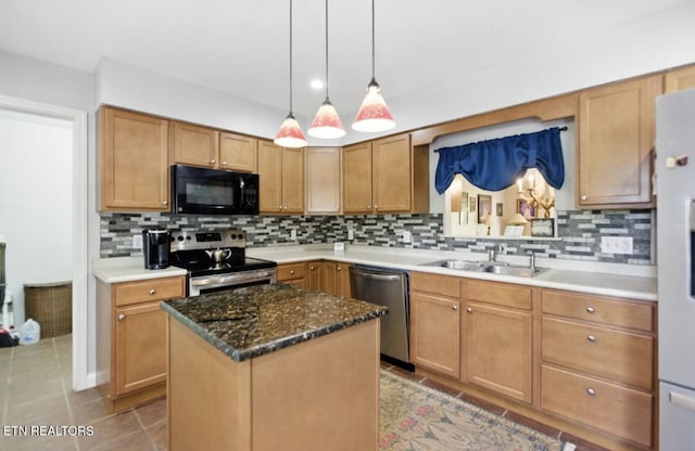 153 Creed Way, New Tazewell, TN 37825 - kitchen featuring stainless steel appliances, tasteful backsplash, a kitchen island, tile patterned floors, and pendant lighting