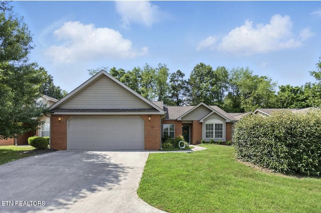 153 Creed Way, New Tazewell, TN 37825 - ranch-style home featuring a garage, driveway, a front yard, and brick siding
