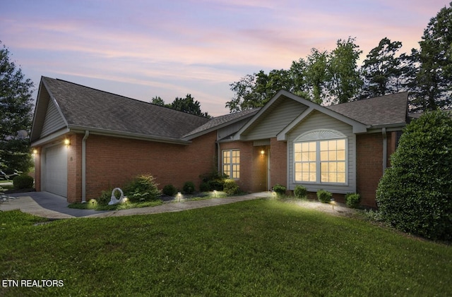153 Creed Way, New Tazewell, TN 37825 - ranch-style house featuring brick siding, a shingled roof, a yard, and an attached garage