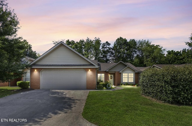 153 Creed Way, New Tazewell, TN 37825 - ranch-style home with driveway, a garage, brick siding, and a yard
