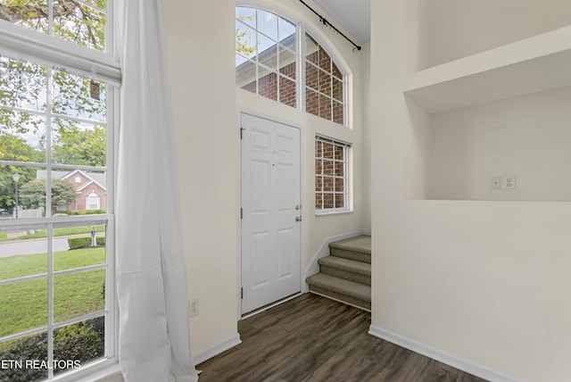 1213 Vale View Rd, Knoxville, TN 37922 - entrance foyer featuring baseboards, plenty of natural light, dark wood-style floors, and stairway