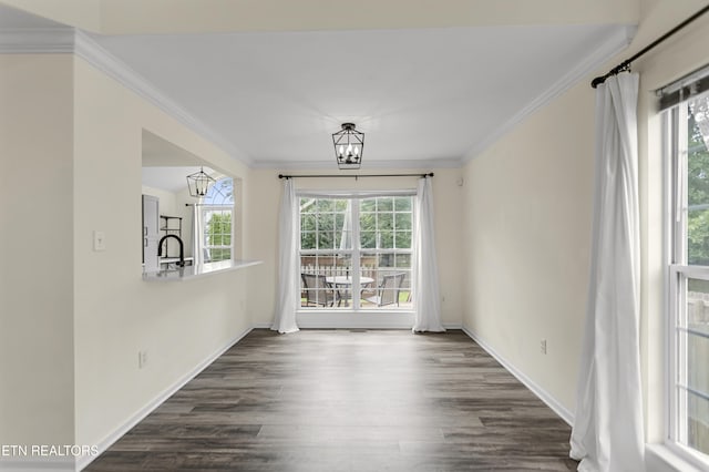1213 Vale View Rd, Knoxville, TN 37922 - unfurnished dining area with ornamental molding, dark wood-style flooring, a chandelier, and baseboards