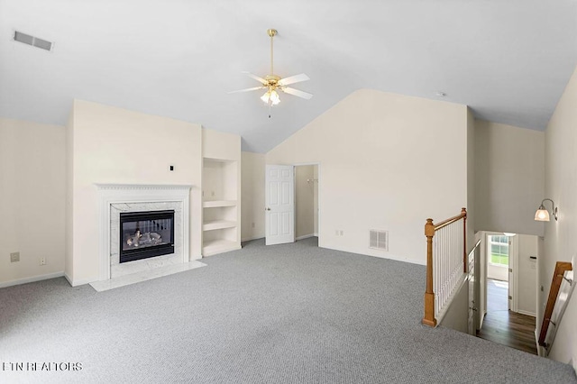 1213 Vale View Rd, Knoxville, TN 37922 - unfurnished living room with ceiling fan, carpet flooring, built in features, high vaulted ceiling, and baseboards