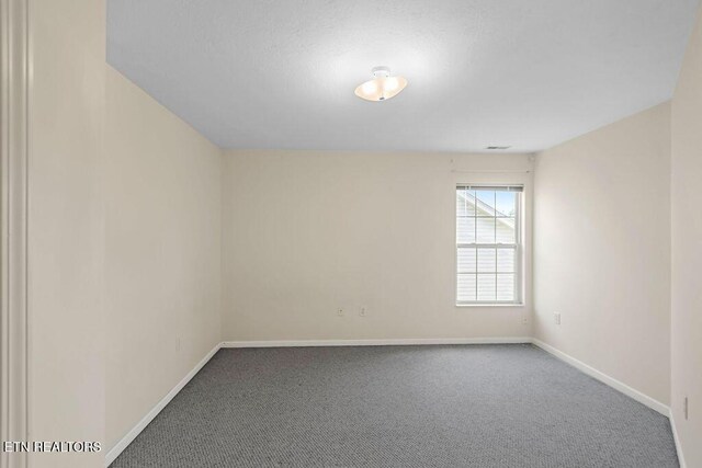 1213 Vale View Rd, Knoxville, TN 37922 - unfurnished room featuring baseboards and carpet