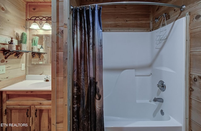 2261 Beach Front Dr, Sevierville, TN 37876 - full bath with shower / bath combo with shower curtain, wooden walls, and vanity