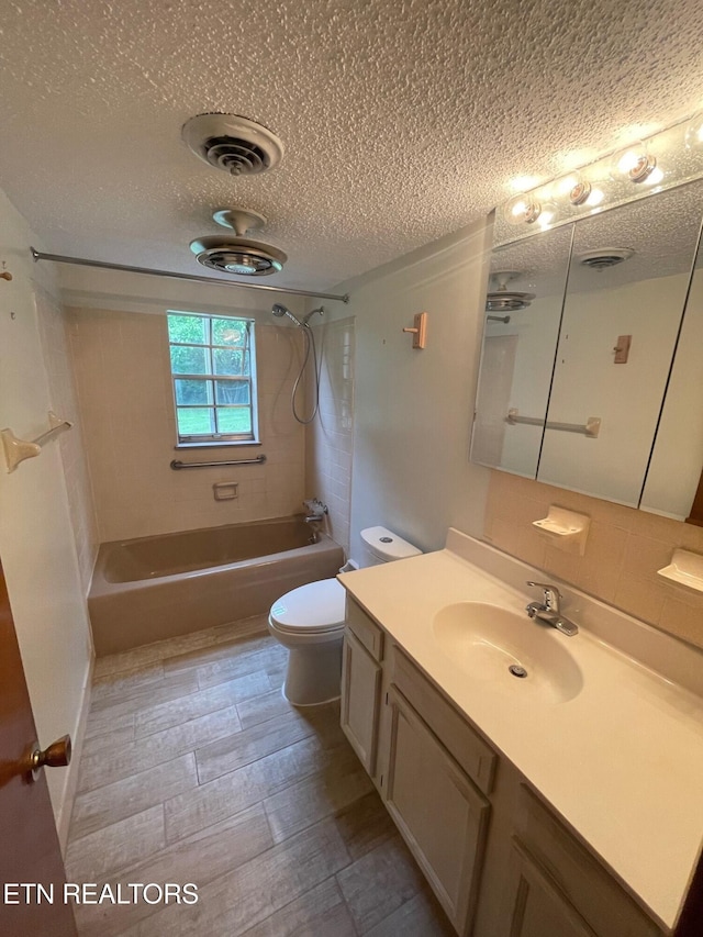 217 Newport Rd Unit 5, Knoxville, TN 37934 - bathroom with a textured ceiling, bathtub / shower combination, vanity, and toilet