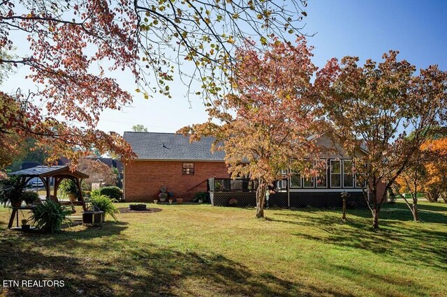 236 Stratford Dr, Cookeville, TN 38506 - view of green lawn featuring a gazebo and a wooden deck