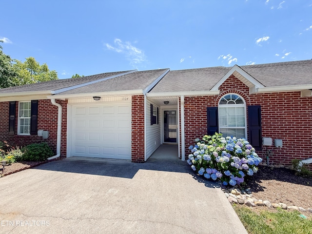 11104 Joiner Way, Knoxville, TN 37934 - ranch-style home with driveway, a garage, brick siding, and roof with shingles