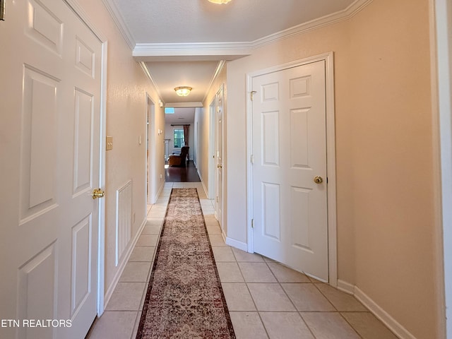 11104 Joiner Way, Knoxville, TN 37934 - corridor featuring light tile patterned flooring, ornamental molding, and baseboards