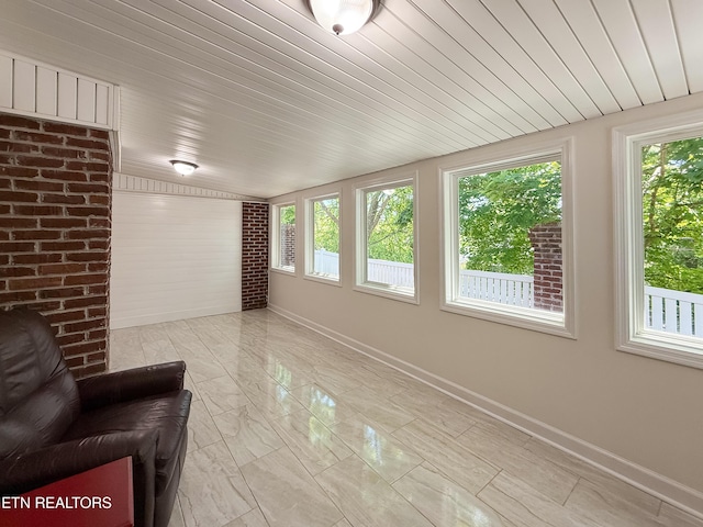 11104 Joiner Way, Knoxville, TN 37934 - unfurnished sunroom with plenty of natural light, baseboards, marble look tile flooring, and wood ceiling