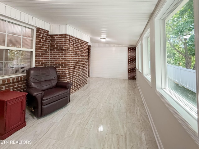 11104 Joiner Way, Knoxville, TN 37934 - sunroom with baseboards and brick wall