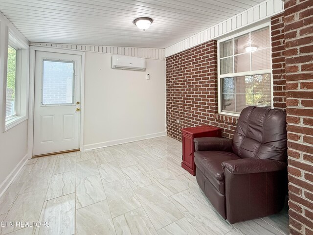 11104 Joiner Way, Knoxville, TN 37934 - sitting room with a wall unit AC, light marble finish flooring, baseboards, and brick wall