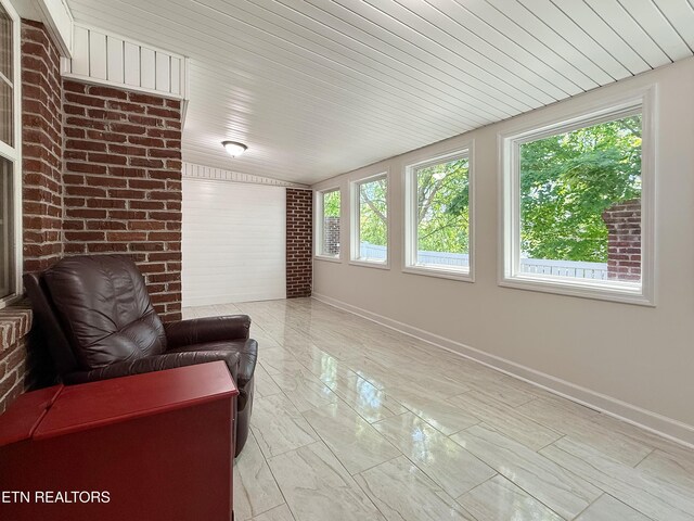 11104 Joiner Way, Knoxville, TN 37934 - sitting room featuring baseboards, lofted ceiling, and light marble finish flooring
