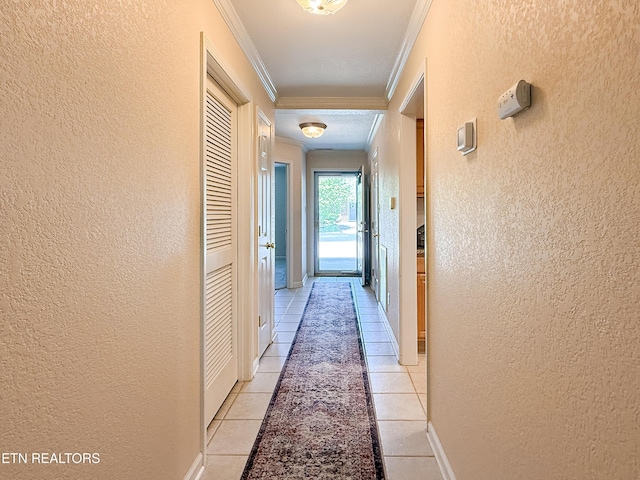 11104 Joiner Way, Knoxville, TN 37934 - hall with a textured wall, crown molding, and light tile patterned floors
