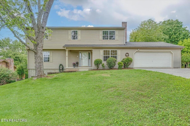 1413 Farrington Dr Unit 1, Knoxville, TN 37923 - view of front of house with driveway, a chimney, a garage, and a front yard