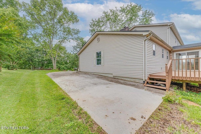 1413 Farrington Dr Unit 1, Knoxville, TN 37923 - view of side of home featuring a deck and a lawn