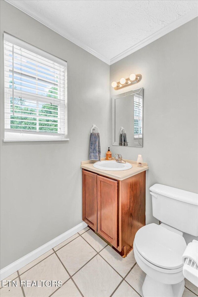 1413 Farrington Dr Unit 1, Knoxville, TN 37923 - bathroom featuring vanity, toilet, crown molding, a textured ceiling, and tile patterned flooring