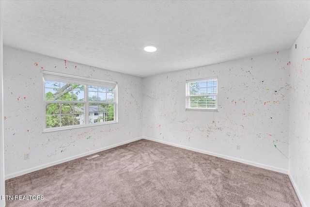 1413 Farrington Dr Unit 1, Knoxville, TN 37923 - carpeted empty room featuring a textured ceiling and baseboards