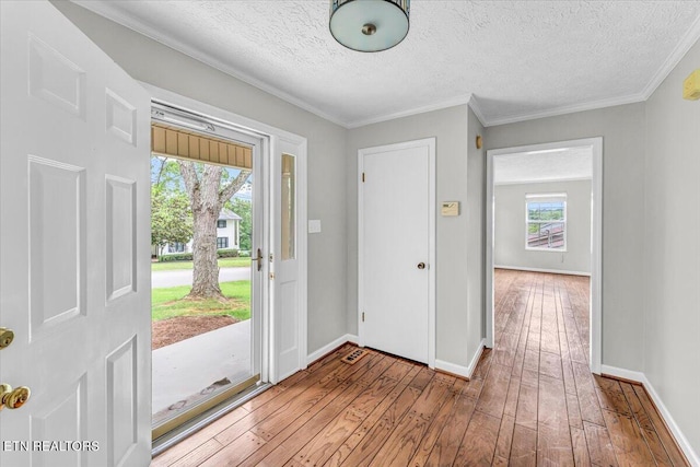 1413 Farrington Dr Unit 1, Knoxville, TN 37923 - foyer entrance with hardwood / wood-style floors, a textured ceiling, baseboards, and ornamental molding