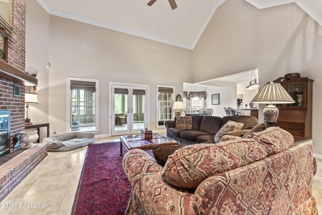 827 Knight Bridge Rd, Maryville, TN 37803 - living area featuring high vaulted ceiling, a fireplace, a ceiling fan, crown molding, and tile patterned flooring
