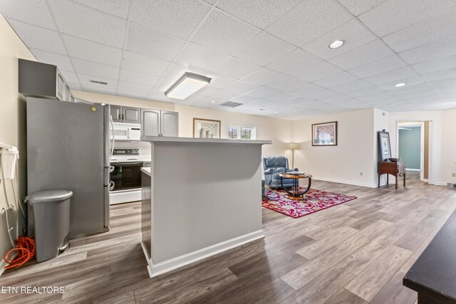 827 Knight Bridge Rd, Maryville, TN 37803 - kitchen with white appliances, dark wood-style flooring, gray cabinets, baseboards, and a paneled ceiling