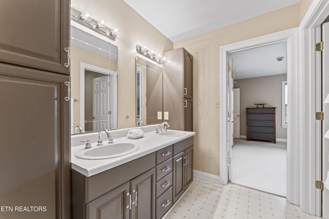 827 Knight Bridge Rd, Maryville, TN 37803 - bathroom with double vanity, baseboards, and tile patterned floors