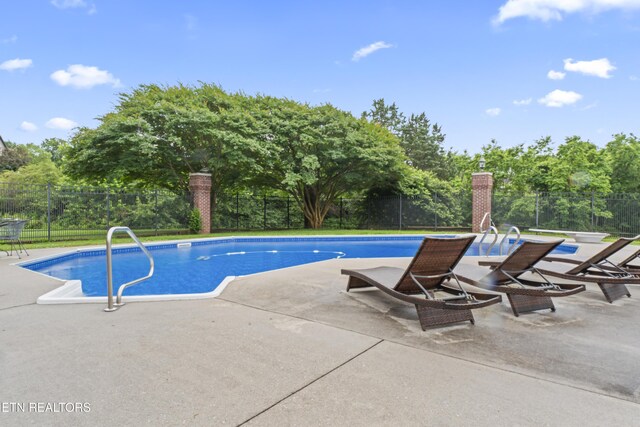 827 Knight Bridge Rd, Maryville, TN 37803 - view of pool featuring a patio area, a fenced backyard, and view of scattered trees