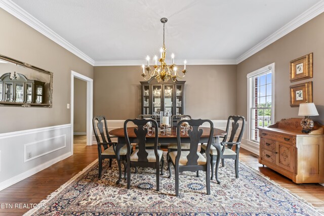 827 Knight Bridge Rd, Maryville, TN 37803 - dining room featuring a chandelier, ornamental molding, and wood finished floors