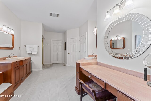 827 Knight Bridge Rd, Maryville, TN 37803 - bathroom featuring baseboards and two vanities