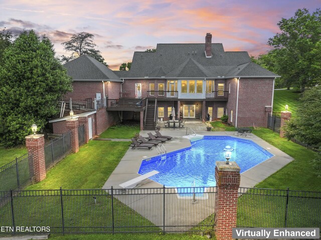 827 Knight Bridge Rd, Maryville, TN 37803 - view of swimming pool featuring stairs, a patio area, a wooden deck, and a diving board