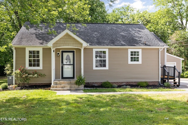 207 N Laurel Cir, Knoxville, TN 37912 - view of front of home featuring a front lawn and a shingled roof