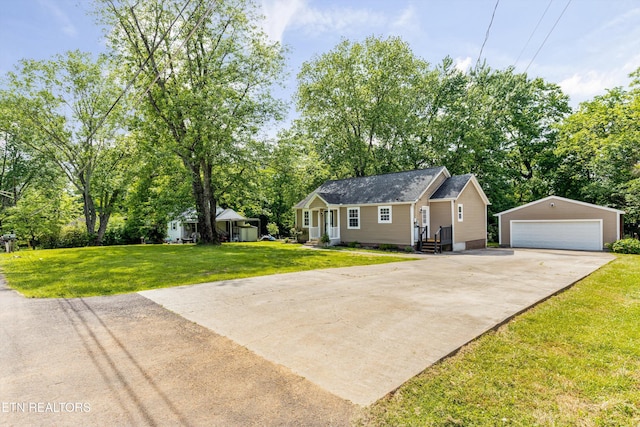 207 N Laurel Cir, Knoxville, TN 37912 - view of front of home featuring an outbuilding, a detached garage, view of scattered trees, a front yard, and entry steps