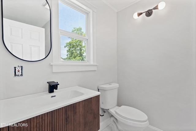 207 N Laurel Cir, Knoxville, TN 37912 - half bathroom with baseboards, vanity, toilet, and crown molding